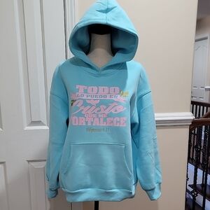 Light Blue Hoodie with Pink Graphic In Vinyl.